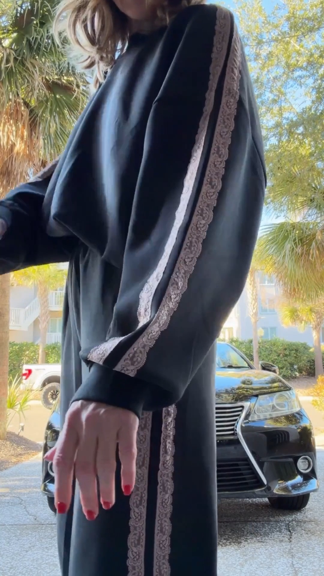 On sale !!! Airy sleek sweatshirt is made from a fabric blend of recycled polyester, rayon and spandex for easy movement. Designed with a relaxed fit and finished with lace-trim detailing for a touch of chic style. Crew neckline and banded hem complete the look with a snug feel. Wearing a small in both 