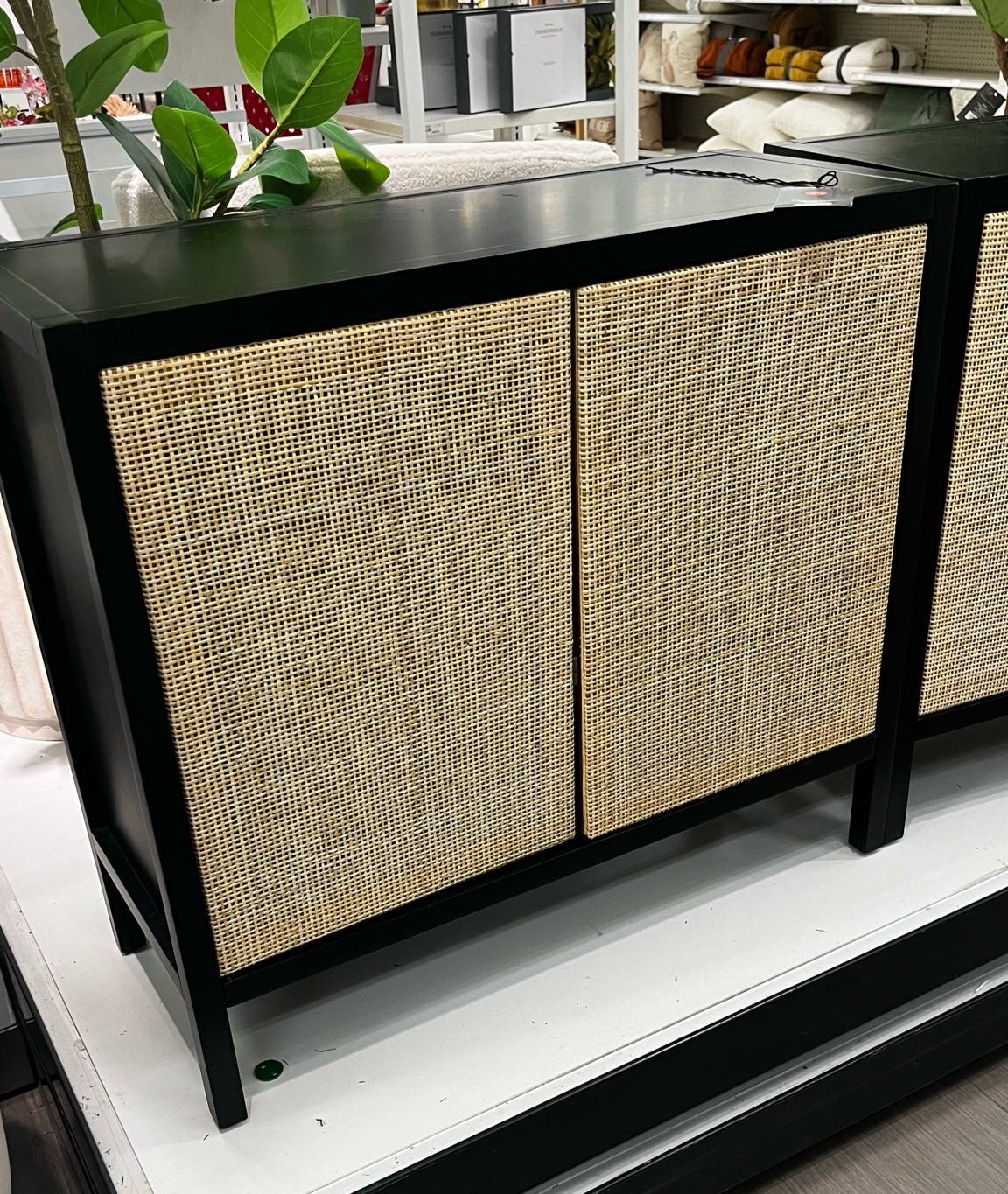 The perfect sideboard for small spaces! Black and rattan look sleek and modern for any style. Easy to assemble and super sturdy for everyday needs. 

#LTKhome #LTKsalealert #LTKSeasonal