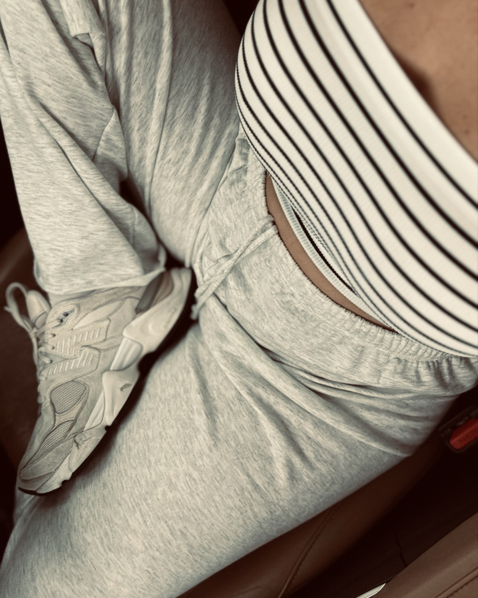 This look is the definition of casual chic. A black-and-white striped ribbed bandeau top pairs perfectly with light gray, high-waisted joggers for that effortless “off duty” vibe. Styled with chunky New Balance sneakers, layered gold jewelry, and oversized sunnies, it’s the kind of outfit that feels cozy for errands but still cute enough for brunch or a casual coffee date.

#LTKSeasonal #LTKActive #LTKOver40