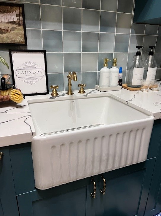 Having a farmhouse sink in our laundry room makeover was a must-have. I love how it looks with the blue tile  

#LTKSeasonal #LTKHome