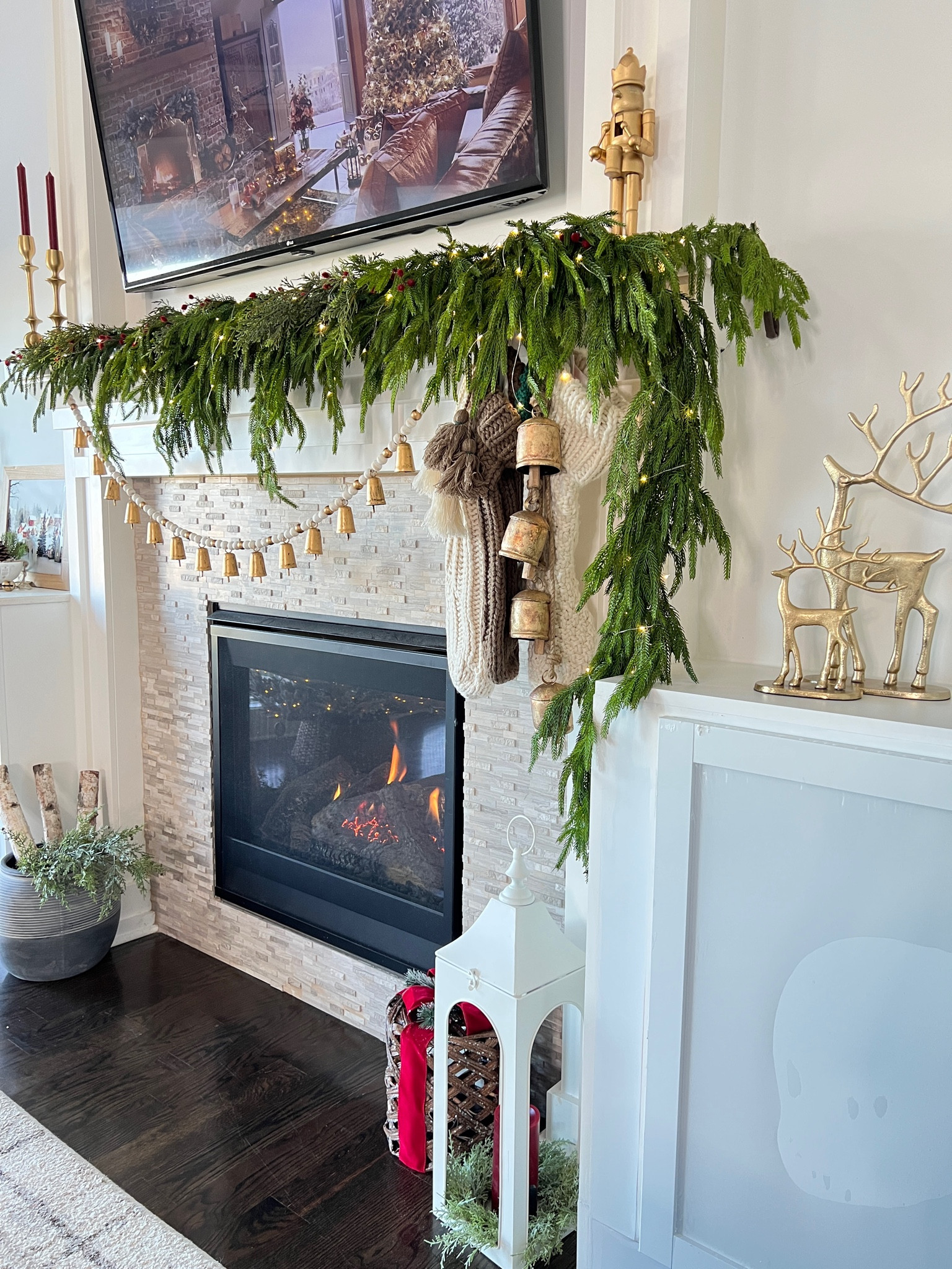 🎄✨Christmas Mantle decorating. Using the Norkfolk pine garland and several Norfolk pine stems and small cedar stems to achieve the look. 🌲✨

#LTKSeasonal #LTKHoliday #LTKhome