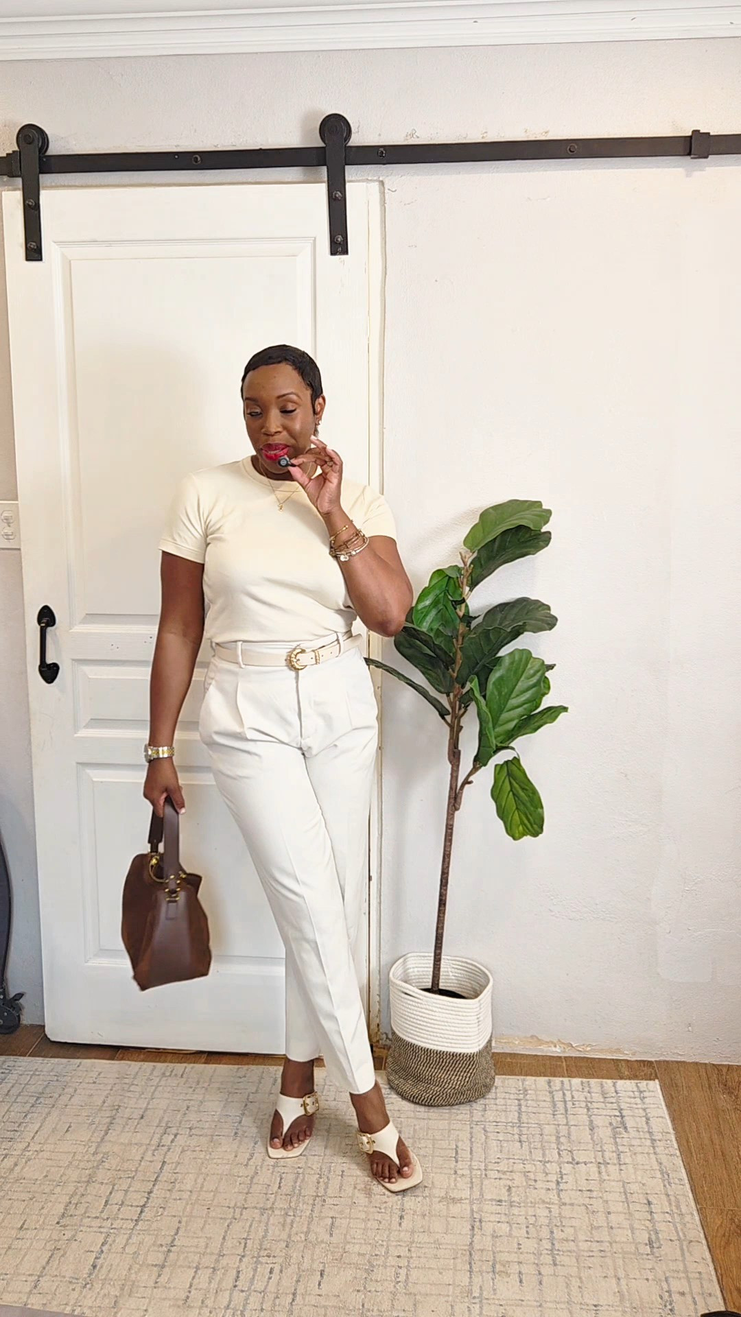 A very comfortable cream monochromatic look for parent teacher conference. My favorite T-shirt paired with dress pants, kitten heels and a fall-inspired handbag. 

#LTKStyleTip #LTKWorkwear