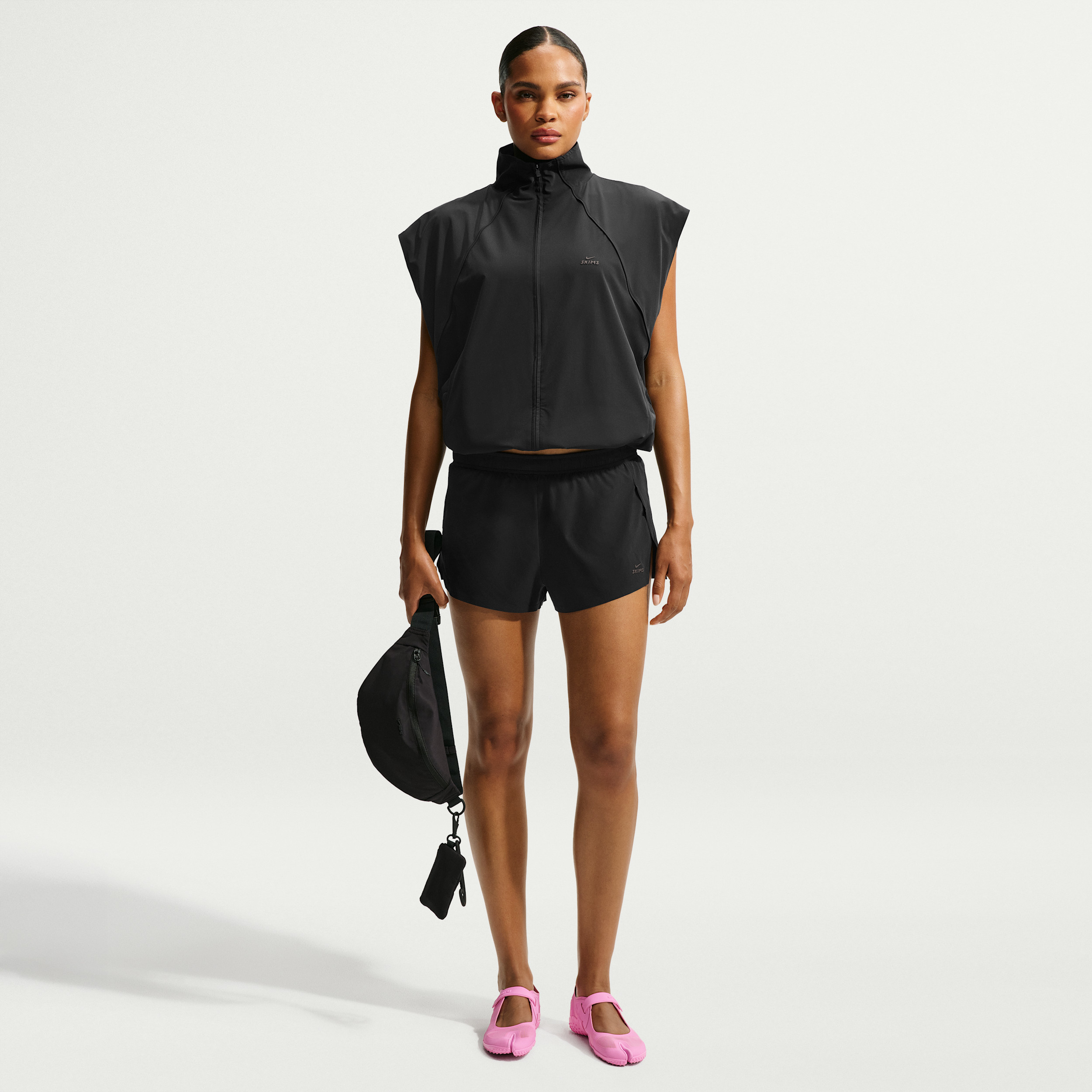Nike Women's SKIMS Stretch Nylon Runner Shorts in Black | IU2226-054 | Nike (US)