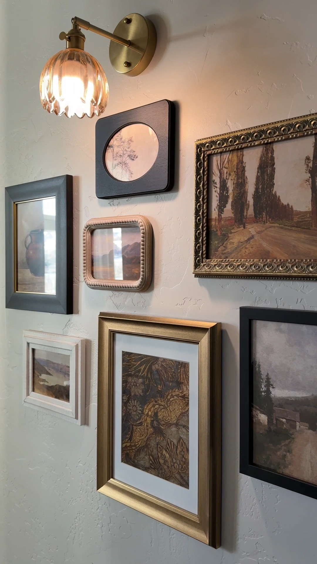 Shop my easy, affordable gallery wall! Vintage prints and battery-operated light from Amazon. 

#LTKFindsUnder50 #LTKWatchNow #LTKHome