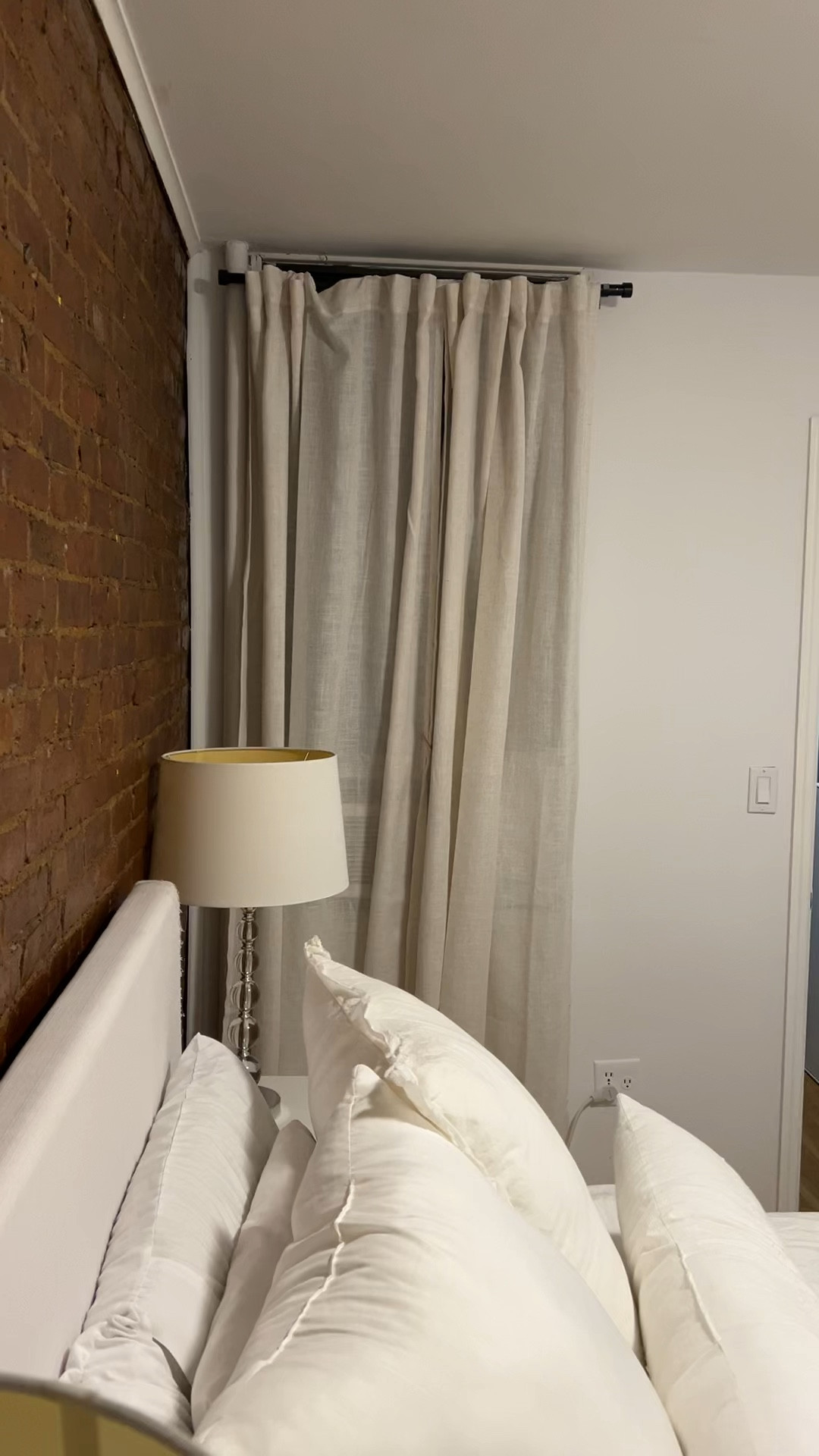neutral bedroom with a pop of charming wallpaper

#LTKHome