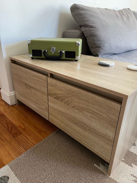 In LOVE with our new end table + with our cutie new record player too 🎶

Pros: 

💚 No filter in only natural light to show true finish! The color is perfection + the wood texture looks so real. It’s a great natural white oak alternative. 

💚 A complete steal at $134! 

💚 True size: 35-7/16”W x 19-13/16”D x 16-5/16”H [trust me.. measuring things is my job] 

💚 An end table with storage was a must in our tiny living room. I love love love these drawers. 

💚 It is technically a coffee table which means all sides are finished + beautiful! 

💚 See more angles of this piece on my feed! 

Cons: 

1️⃣ It took a long time to assemble. 

2️⃣ We knew this going in, but the finish is not super durable. Our first shipment had some damage, so we needed to exchange it for another. But since then, no sign of wear + tear at all! 

All in all, both cons were 100% worth the extremely affordable price. We are so happy with it + it really levels up our space ✨ 

coffee table with drawers, sled coffee table drawers, affordable white oak coffee table, white oak veneer, modern white oak coffee table, modern coffee table storage, rectangular coffee table storage, latitude run Sonoma oak, latitude run coffee table white chipboard, vidaxl coffee table Sonoma oak, vidaxl coffee table drawers, 3’ coffee table, 36” coffee table, small living room coffee table, small living room ideas, minimal coffee table, minimalist coffee table, minimalistic coffee table, minimalism coffee table

#LTKFind #LTKhome