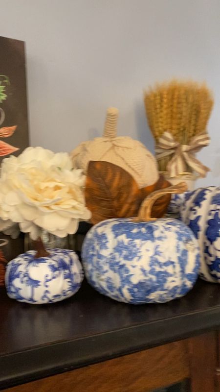Blue and white Thanksgiving decorating ideas for shelf, mantle, on top of china cabinet. 

Pottery Barn: Give your autumn decor an artisanal look with this pumpkin made from braided rope. Place one, or a vignette of several, on a coffee table or console, mantel or desktop, to add touchable texture to your living and work spaces. 

Etsy sale: Happy Pumpkin Spice Season, Chalkboard Art, Chalk Art, Fall Decor, Fall Leaves, Pumpkin Art, Autumn Decor, Pumpkin Spice. SET OF 3 Blue and white floral chinoiserie style fall pumpkins. Large Velvet Pumpkin Slate Blue, wedding centerpiece, modern rustic decor, shabby chic mantle decor, farmhouse decor, best selling item. 


Amazon: Primitives by Kathy Set 3 Autumn Small Bottle Brush Trees - Fall Colors - 3.5 Inches Tall. Moomass Artificial Hydrangea and Glass vase Decoration, Ins Style Artificial Flower Glass Bottle Set. 

At Home: Fall into the season with our delightful home decor items. Whether it's a festive wreath, pumpkin-inspired accents, artificial florals/greenery or cozy throw blanket, we have everything you need to create an inviting atmosphere that celebrates the beauty of the harvest time of year. Enjoy our 19in. Providence wheat bundle table decor and celebrate and experience the season to the fullest.

Anthropologie: Boulangerie Pumpkin Soufflé Jar Candle
.
.
.
.
.
.
.
.

.
.
.
.
.
.
.
.
#ltkstyletip #ltksalealert #ltkshoecrush #ltkfashion #ltkfamily #ltkbeauty #ltkitbag #ltkseasonal #ltkkids #ltktravel #ltkfit #ltkbump #ltkswim #ltkworkwear #ltkholiday #ltkfind #ltkfindsunder50 #ltkfindsunder100 #ltkgiftguide #ltkplussize #ltkvideo #ltkover40 #ltkxprime #ltkcon #ltkparties #ltkcyberweek #ltkholidaysale #julieannrachelle
#thanksgivingdecor #thanksgivingdecorations #thanksgivingdecoration #thanksgivingprep #thanksgivingdinner #thanksgivingtable #thanksgivingtablescape #thanksgivingfeast #thanksgiving #thanksgivingcelebration #hostingthanksgivingdinner #falldecor #hostingthanksgivingthisyear #thanksgivingoutfit #thanksgivingservice #julieannrachelle

#LTKHoliday #LTKVideo #LTKhome
