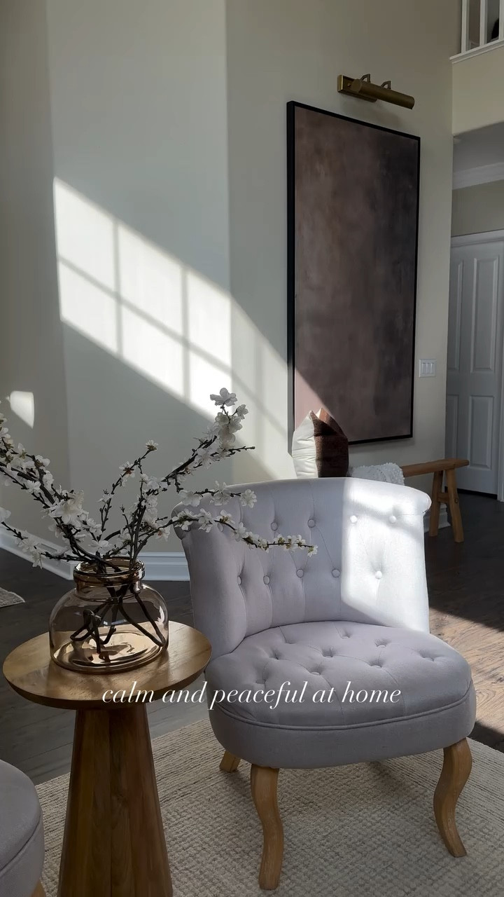 Calm and peaceful… that’s how your home should make you feel🤍 Loving those vibes? Follow along our journey to help you create a home you love 🫶🏼

See something you like? Comment SHOP for the links! 
 Organic modern, picture light, swivel chair, loloi rug, neutral rug, table lamp, brown throw blanket, bedding, primary bedroom, travertine, candleholders, spring florals, Wayfair, Amazon finds 

#homeviews #peacefulhome #interiorstyling

#LTKSeasonal #LTKHome