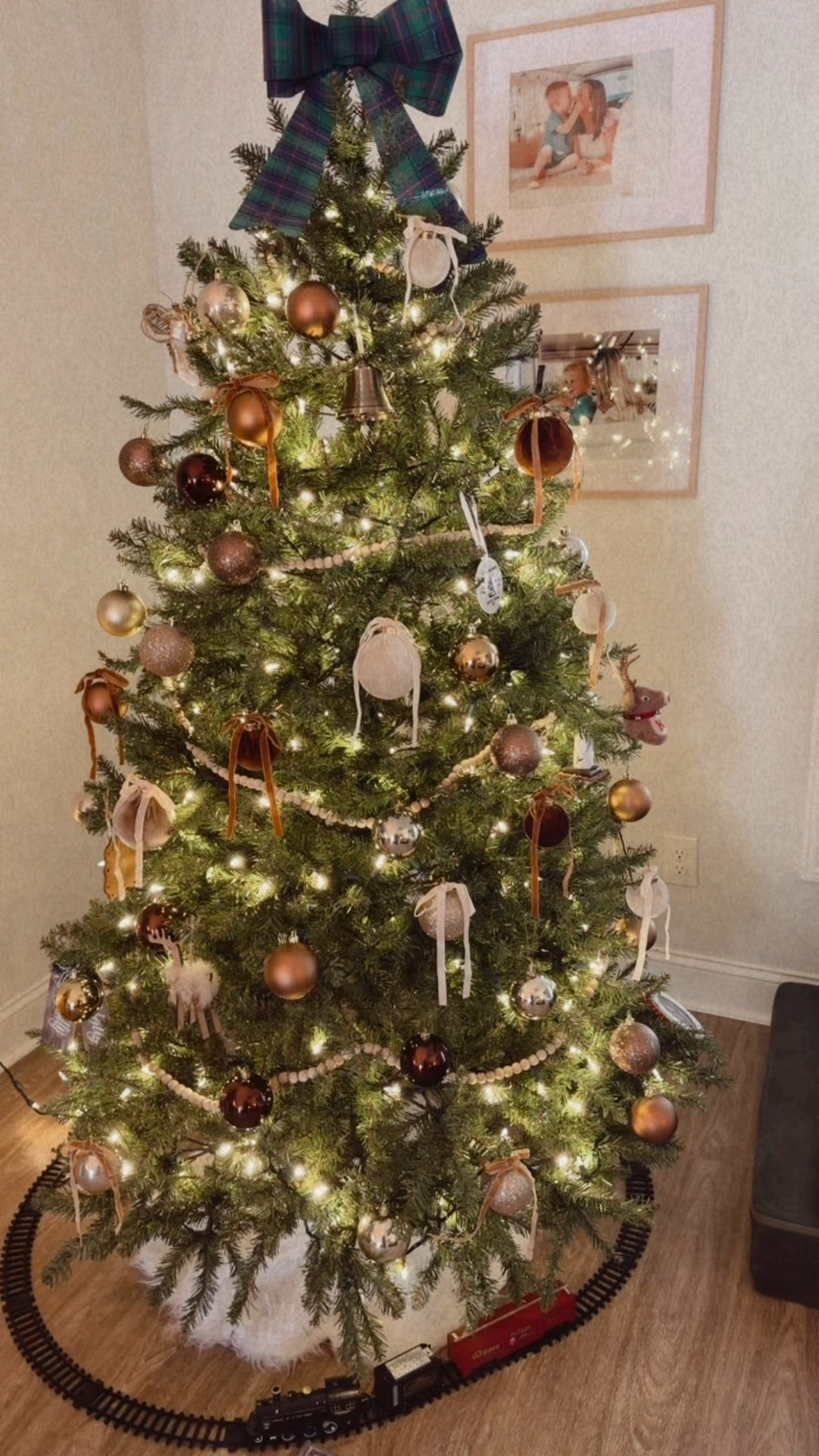Added the velvet ornaments with bows this year to the christmas tree 🤎🫶 also this train for under the christmas tree is so much fun for kids! ♥️

christmas | christmas tree | christmas bow | ornament | bow ornament | amazon | neutral christmas | gold christmas | christmas train | train under the tree | christmas 2025 | cozy winter views 

#LTKGiftGuide #LTKSeasonal #LTKHoliday