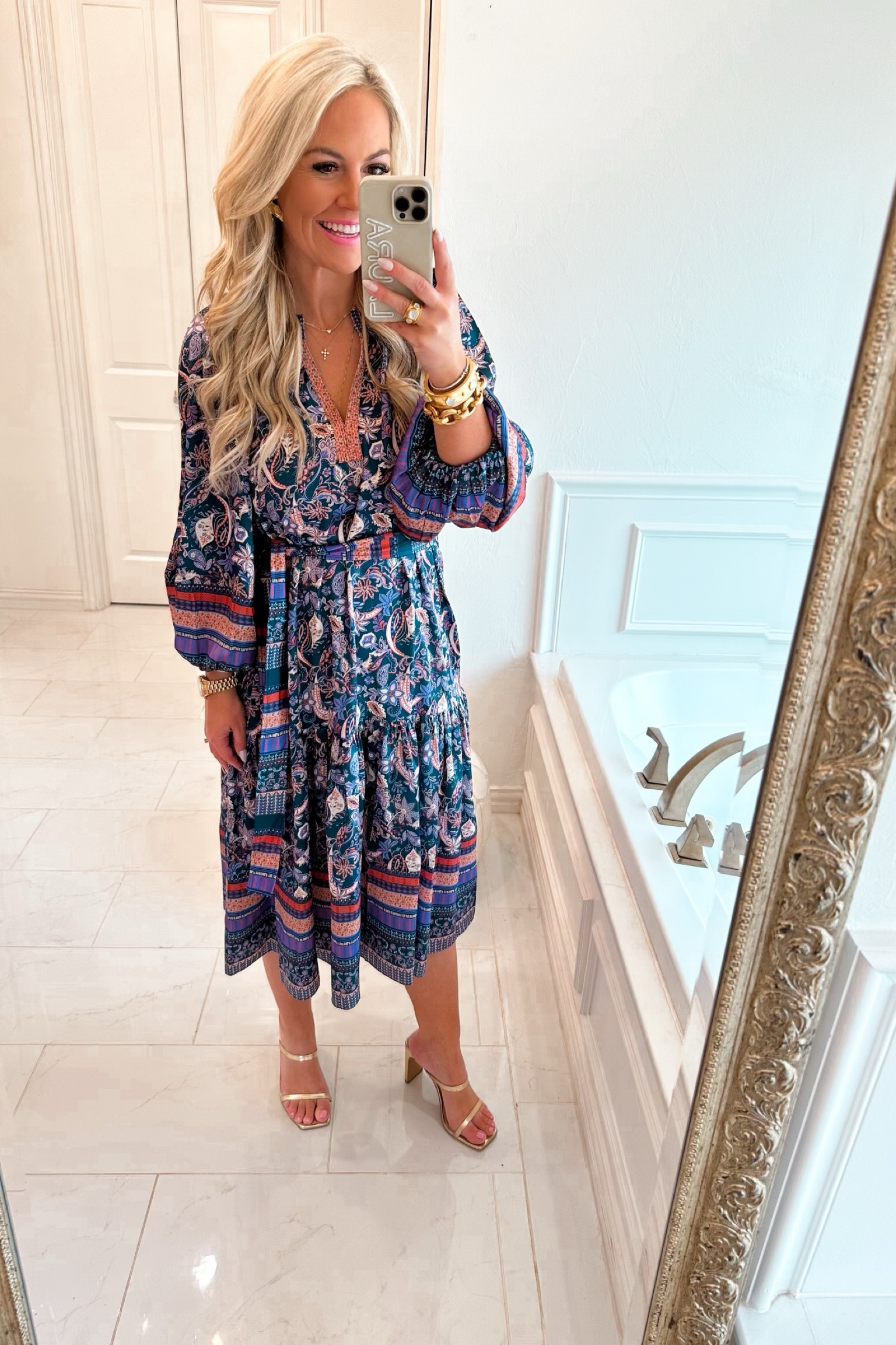 This midi is such a great designer dupe!! Love this gorgeous print and color palette for fall. Runs tts wearing size small. 

#LTKfindsunder100