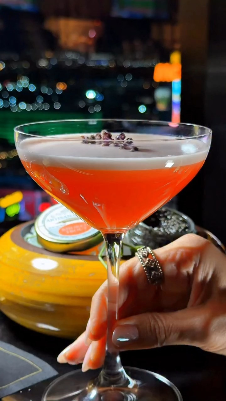 Golden hour at the Waldorf Astoria. ✨ Sipping cocktails and taking in the ultimate Las Vegas skyline. This vibrant yellow halter gown from Revolve is the absolute perfect silhouette for an elevated evening out. The elegant drape and bold color make it a total showstopper for any special occasion. 🥂🏙️ 

 #LTKgrwm #LTKvlog #LTKTravel