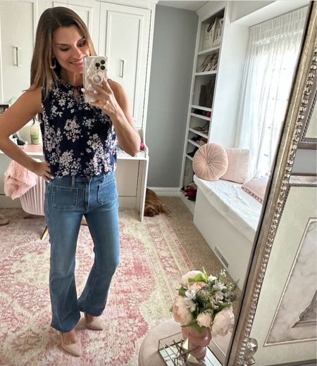Floral top for spring - Use code CANDACE10 to save 10% off my top. Everything is true to size. Wearing a small in the top and 4/27 in the jeans.

#LTKunder100 #LTKunder50
