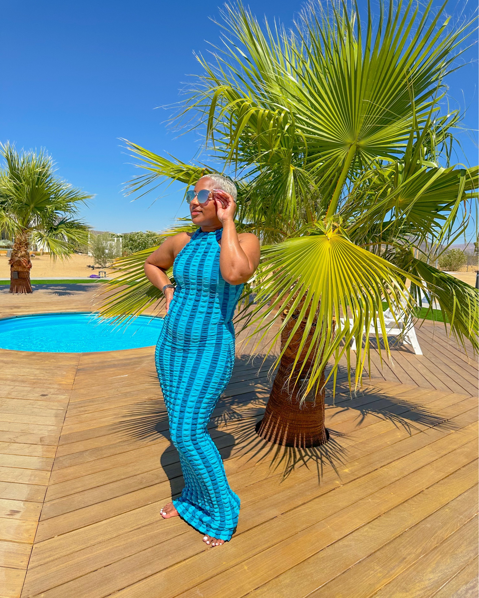 When I say this dress is NECESSARY for your next vacation I mean it. It hugs in all the right places and has a ton of stretch. I’m wearing a size small. And don't forget the body glow.

#LTKBeauty #LTKTravel #LTKStyleTip