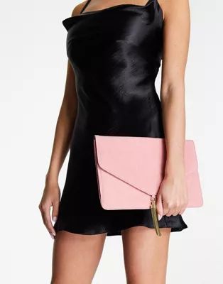 ASOS DESIGN tassel clutch bag in pink | ASOS (Global)