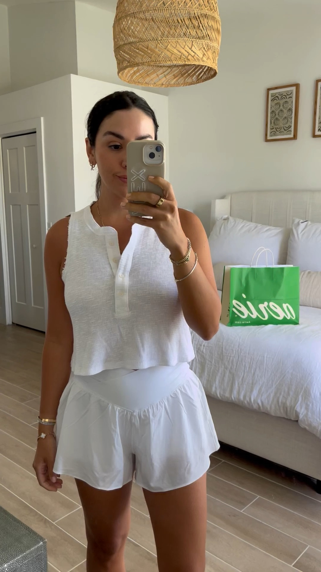 Another summer staple! Perfect white tank you can wear casually, on walks, workouts, over bathing suits etc!

#LTKunder100 #LTKunder50