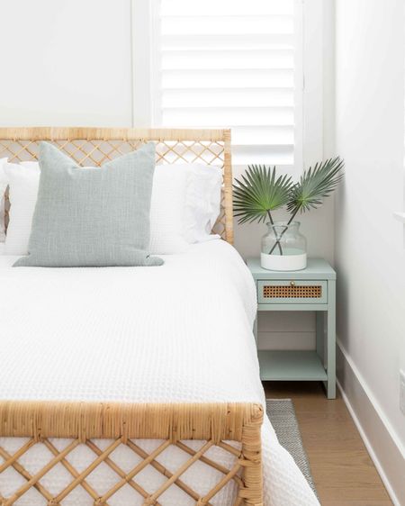 Our Florida carriage house bedroom featuring a rattan bed frame, Swedish blue herringbone rug, white waffle knit bedding, our favorite affordable sheets, light blue and cane nightstands, and faux palm leaves. Take the full tour here: https://lifeonvirginiastreet.com/our-florida-carriage-house-tour/ . 


coastal bedroom decor, Serena & Lily style, neutral bedroom decor

#ltkhome #ltkseasonal #ltkfindsunder50 #ltkstyletip #ltkover40 #ltktravel #ltkfindsunder100 #ltksalealert

#LTKhome #LTKsalealert #LTKSeasonal