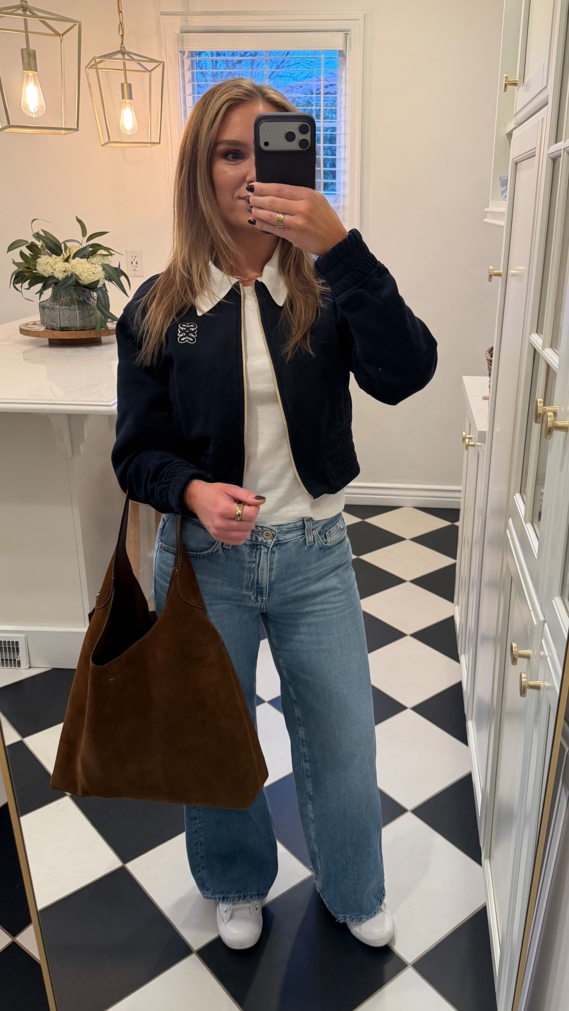Travel day uniform ✈️🤎 Comfy enough for the plane but still polished. Wearing my Sandro cropped jacket, AG wide-leg jeans, and classic Converse. And this Coach tote is one of my go-to travel and work bags — fits a laptop, chargers, snacks, and everything I need.

#Workwear #AirportStyle #TravelOutfit #AGJeans #Sandro #ConverseStyle #CoachBag #EverydayStyle #Coach #OOTD #Travel 

#LTKootd #LTKPetite #LTKTravel