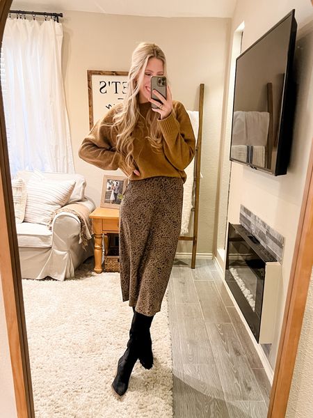 Sweater + skirt combo for winter 🖤

Winter workwear. Sweater. Midi skirt. Boots. Smart casual. Business casual. Dressy dinner outfit. 

#LTKSeasonal #LTKworkwear