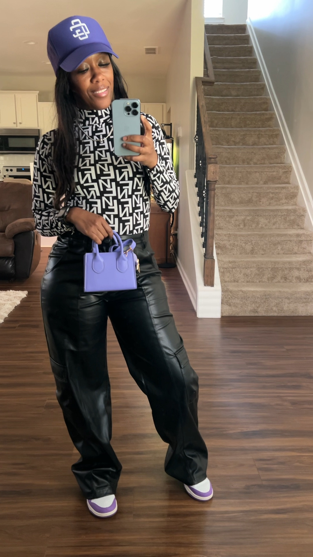 How to style black faux leather pants. I styled these pants with a black and white bodysuit, purple trucker hat, purple purse, and purple and white Nike dunk low sneakers

#LTKFindsUnder100 #LTKStyleTip #LTKSeasonal
