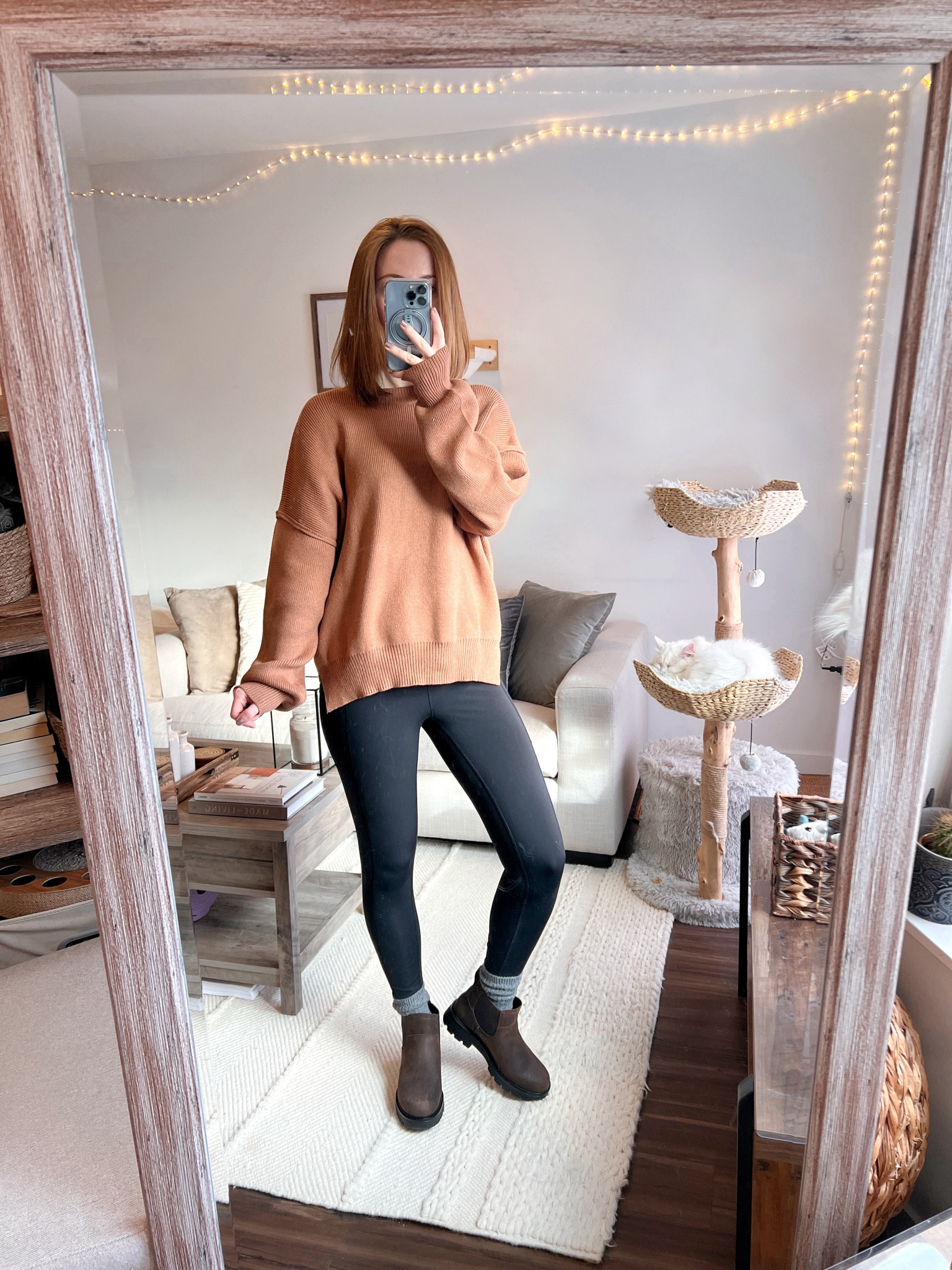 Comfy and casual OOTD featuring a cozy oversized sweater and Uggs! 🤎 Love these shoes because they look exactly like Blundstone boots (but without the  price tag)! 🏷️ 
Living room: grey, beige, and white color palette, neutral home decor, wicker and rattan accents, modern cat furniture, rustic farmhouse style

#LTKshoecrush #LTKU #LTKhome