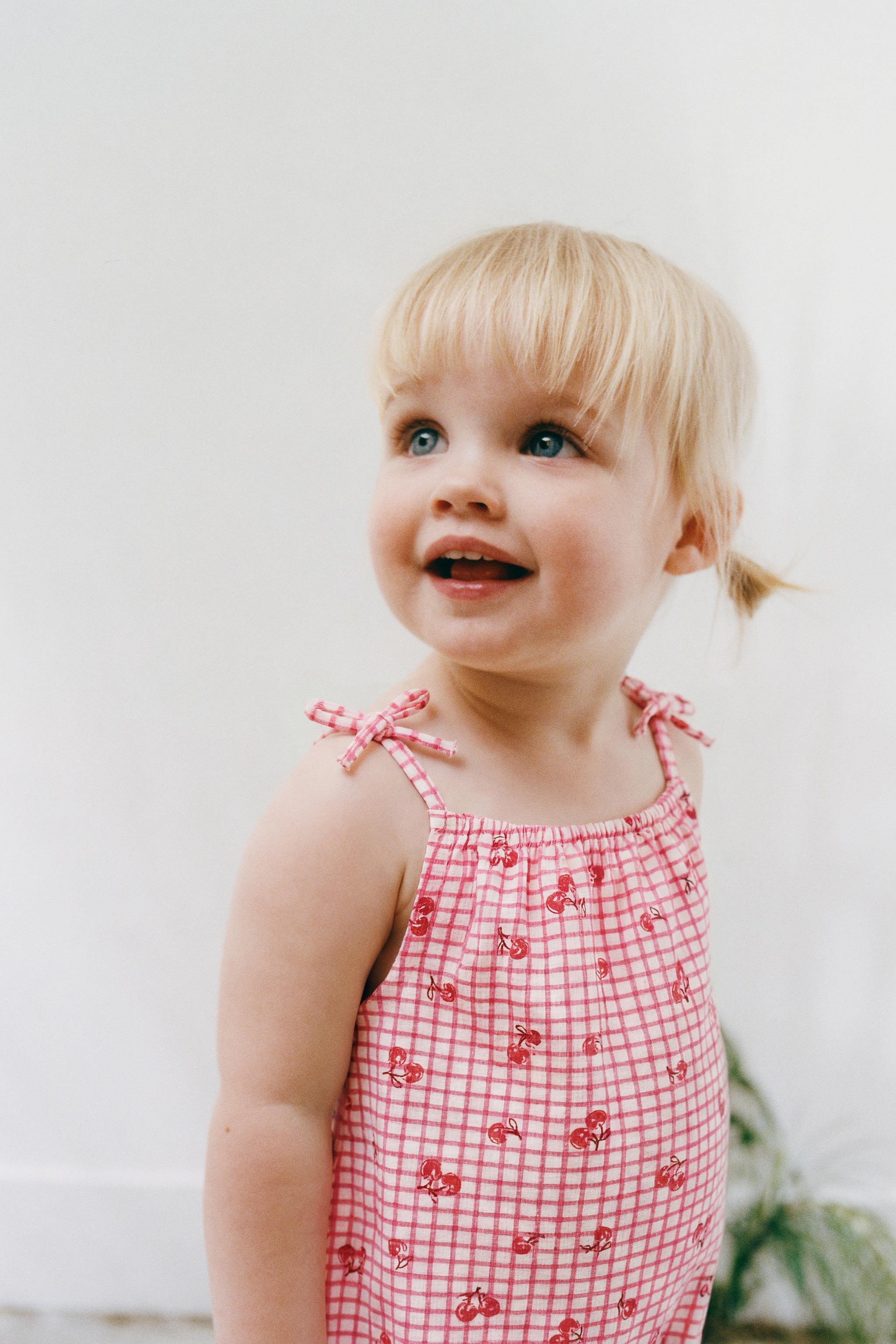 Romper with straight neck and straps with bow appliqu\u00e9. Plaid and cherry print. | Zara US