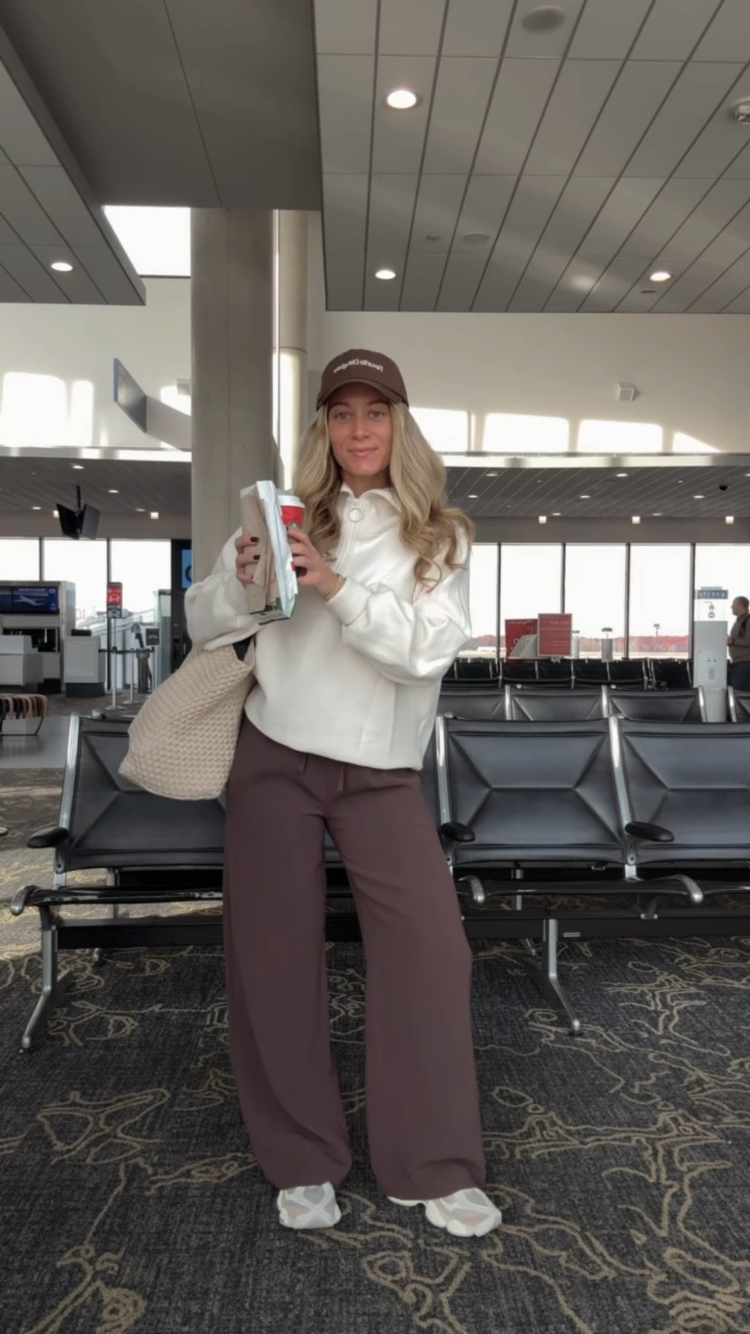 Airport OOTD 🤎 Wearing this Varley half zip (small), Amazon long sleeve tee (small) & Aritzia lodge pants (small).

#LTKStyleTip #LTKItBag #LTKTravel