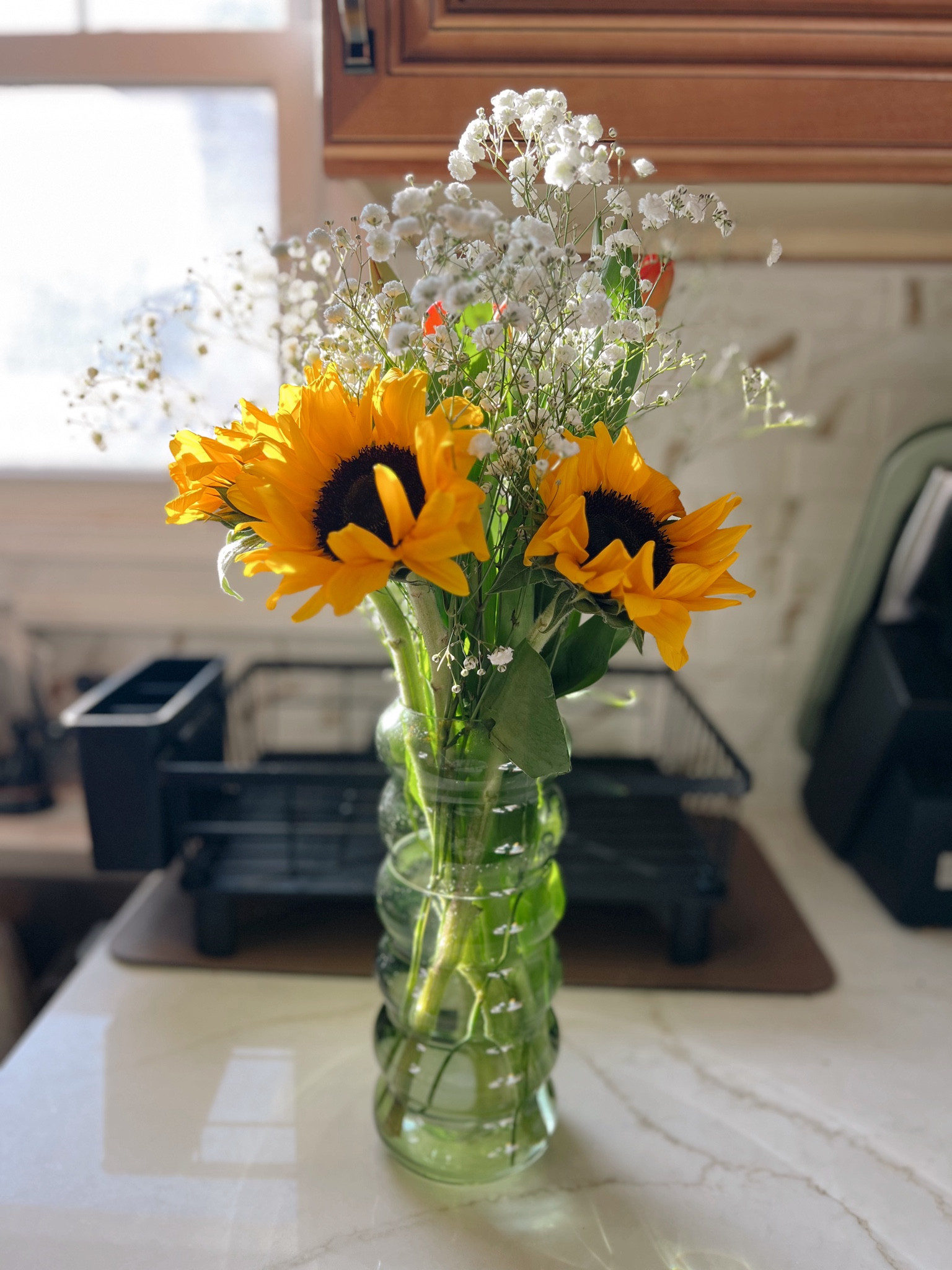 If you want flowers, buy the flowers, but a cute vase to put them in is important too 🤭🌻🌷 I’ve been on a big sage green kick and it has become the color of the kitchen! This is why I thought the green vase would accent the kitchen very well 💚

#LTKMostLoved #LTKHome