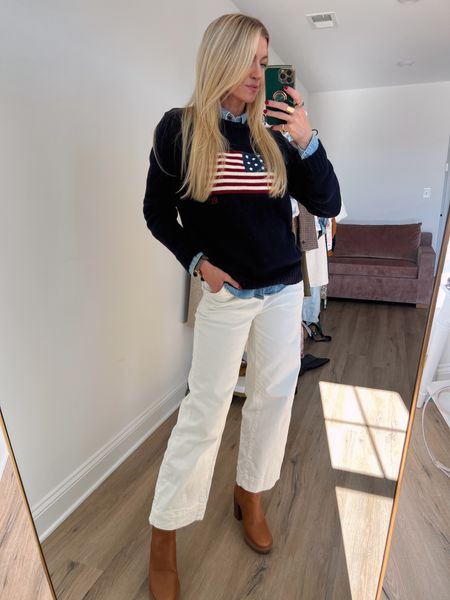 American flag Ralph Lauren sweater (wearing a small) + chambray top layered under + cream Everlane wide leg jeans + cognac boots #ltkfind 

#LTKSeasonal #LTKstyletip