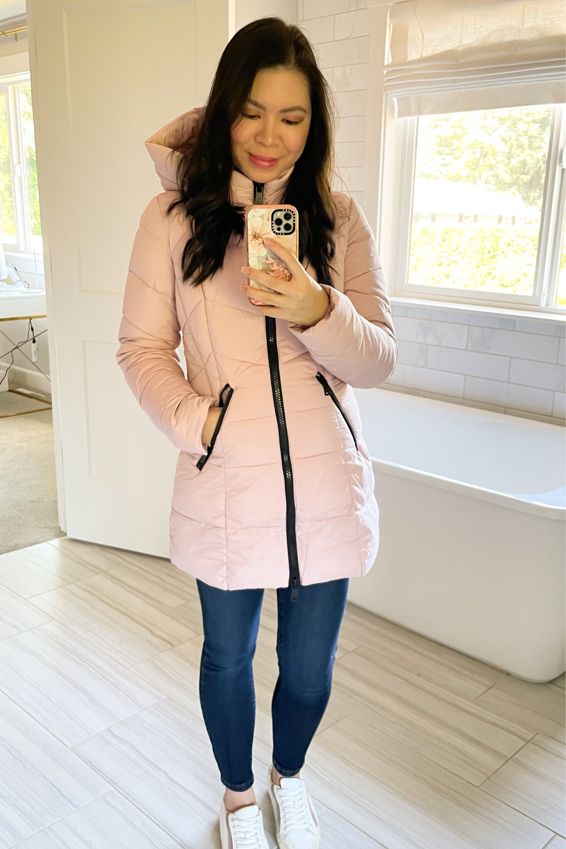 Hooded pink puffer coat. Lightweight yet warm and comfy. Also water resistant. Currently marked down over 40% to $99!

#LTKSeasonal #LTKsalealert #LTKfindsunder100
