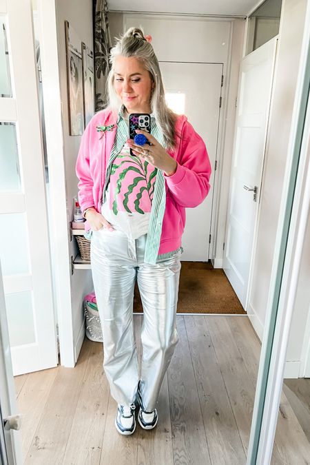 Ootd - Saturday. Silver trousers paired with a white t-shirt with a green and pink graphic print, a green striped buttondown shirt and a pink hoodie. Green and blue dragonfly brooch, claw clip in the shape of a bow and chunky Skechers sneakers. 



#LTKover40 #LTKstyletip #LTKmidsize