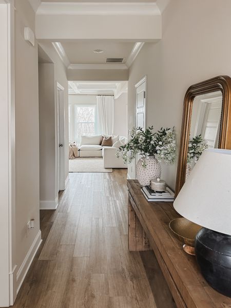 Earthy, modern organic front entryway style! Decorated with warm wood tones,
gold accents and spring faux florals! 


Affordable finds, furniture finds, Amazon finds, gold accents, gold arched mirror, upholstered furniture, wood table, front entry way, styled home, shop the look

#LTKhome #LTKSeasonal #LTKSpringSale