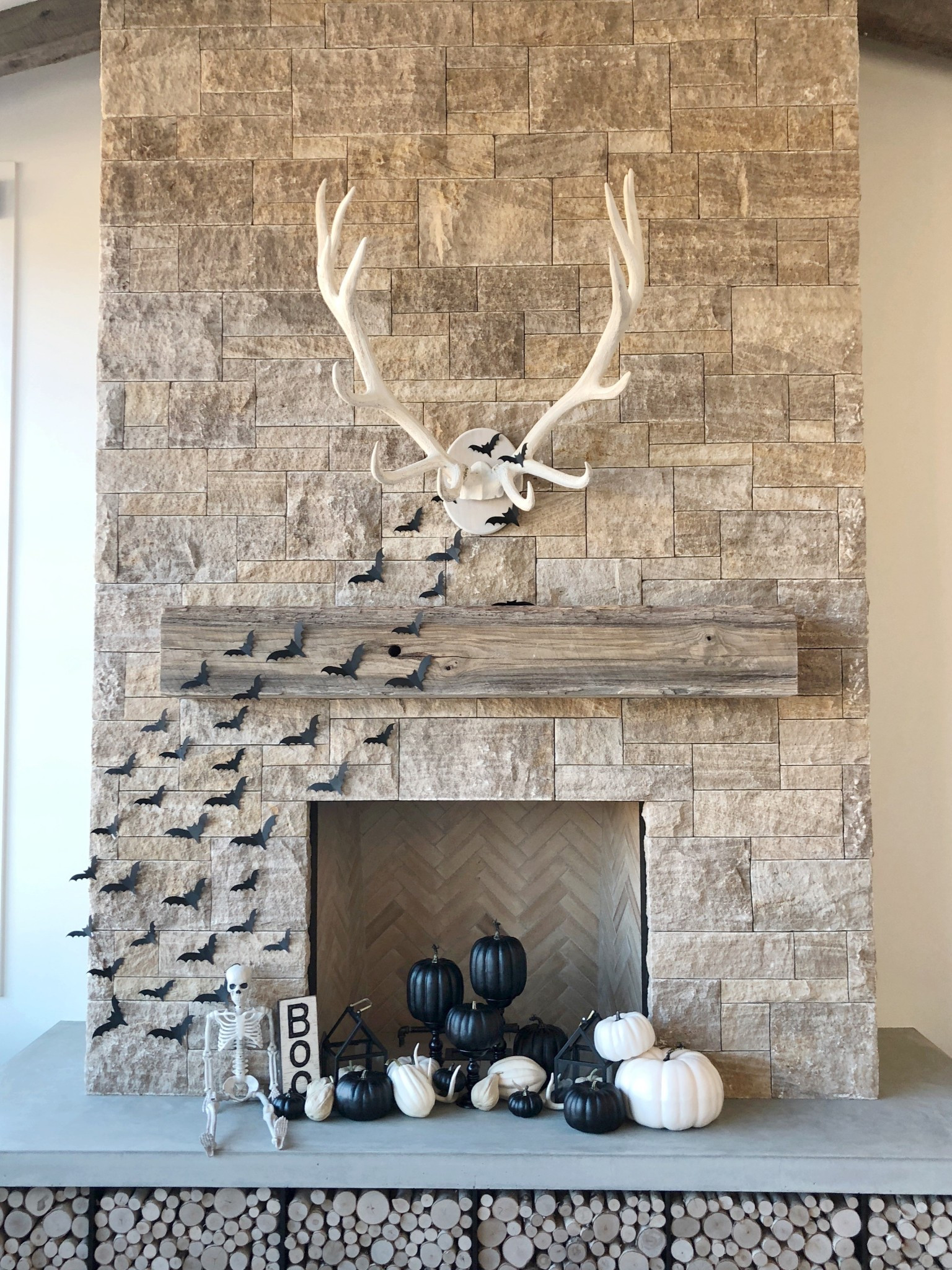 Halloween bats styling in a living room!

Mantel
Fireplace 
Home decor 
Fall

#LTKHome #LTKSeasonal