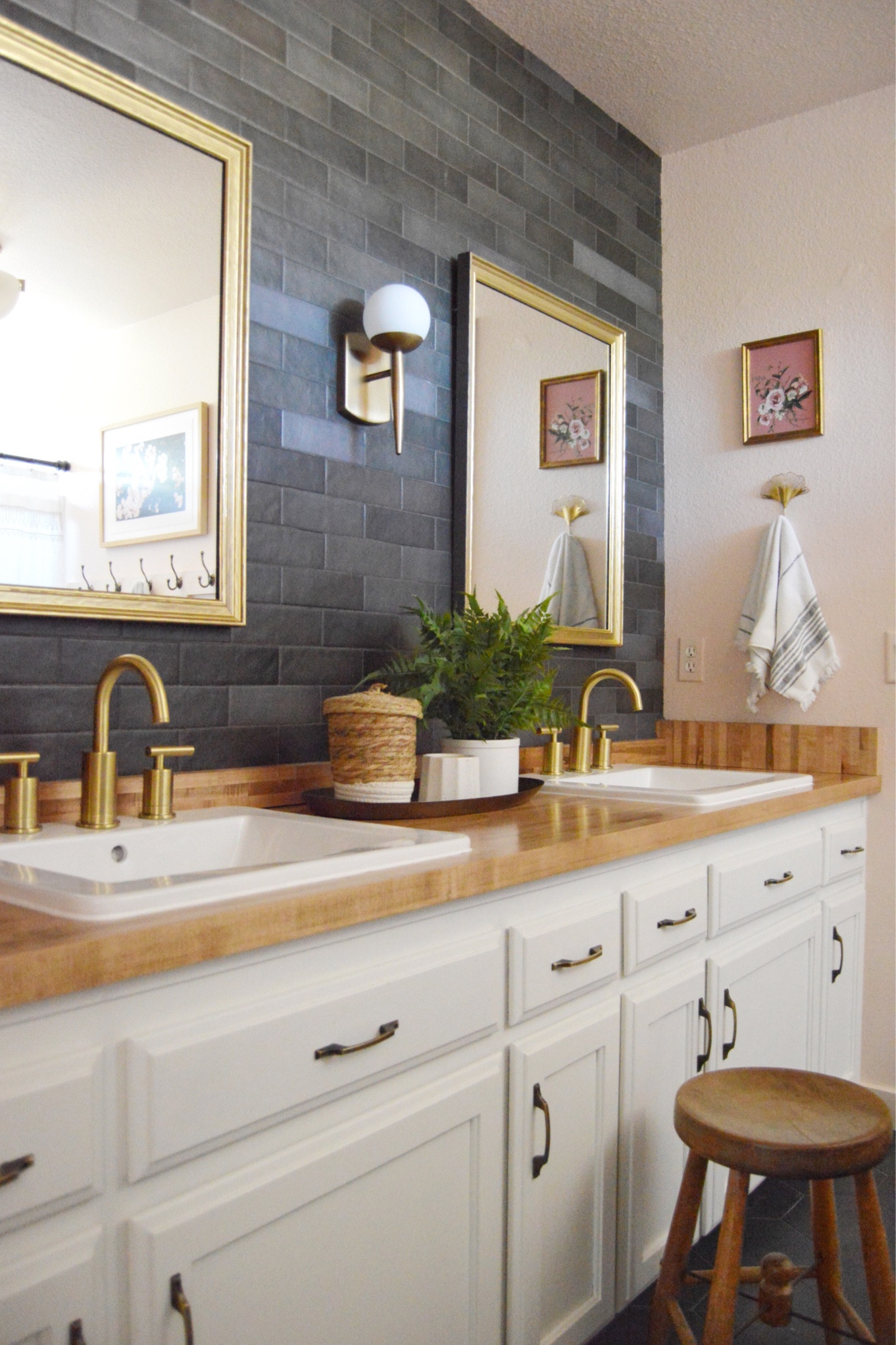Bathroom decor featuring a new bathroom faucet, mirrors, wall sconce, lighting, artwork, towels, faux plants, hardware, and more! 

#LTKfindsunder100 #LTKhome #LTKfindsunder50