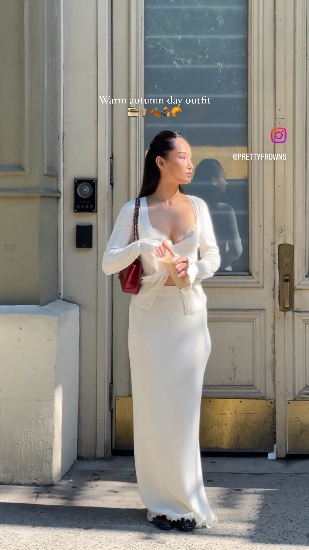 Cream cardigan styled with a lace bralette, knit maxi skirt, ballerina flats and red bag

#LTKstyletip #LTKVideo