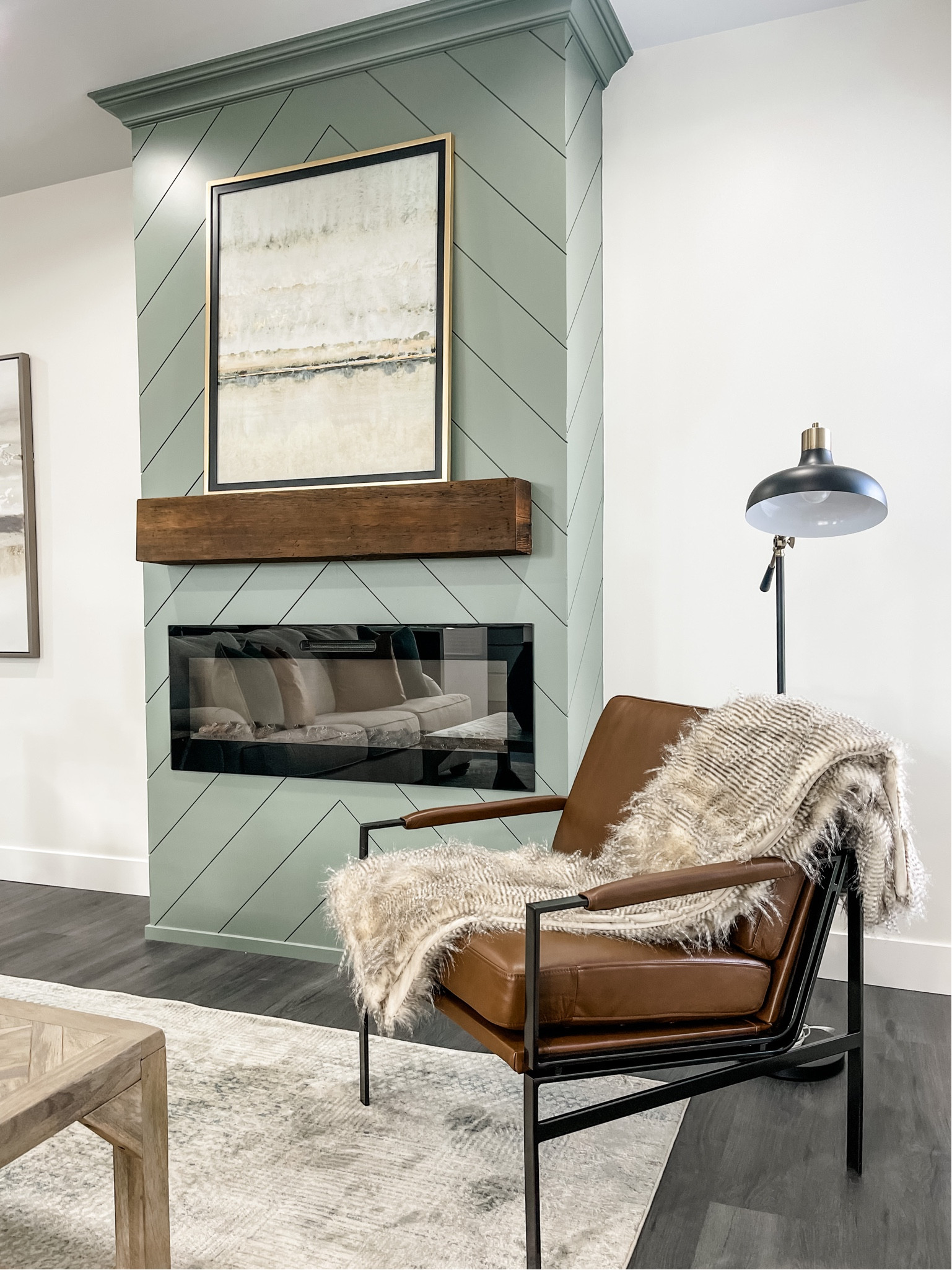 Leather chair that’s great for a family room! Add the fur throw to bring more warmth and texture to the space.

#LTKstyletip #LTKhome #LTKfamily