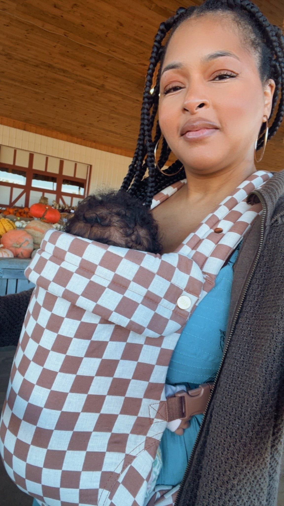 Love our Mabe baby carrier — this checkered pattern is everything!✨Baby girl always falls right to sleep & I love that she feels so secure 😊

#LTKBaby #LTKTravel