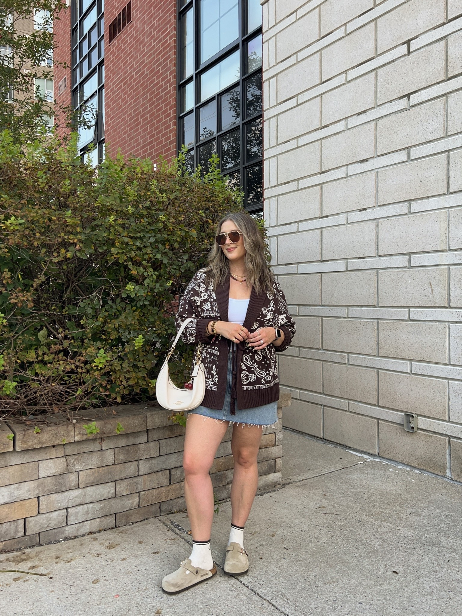 Fall outfit from @abercrombie ! Wearing L in the bandana print cardigan (not itchy at all!). Wearing M in the bra free tank top. I bought this denim skirt last year in a size 32, would do a 31 if I was purchasing now. I wear a 30 in A&F 90s relaxed jeans for reference! I’m a 9.5-10 shoe and wear a 40 in the Birkenstock clogs

#LTKfall #LTKmidsize #LTKstyletip