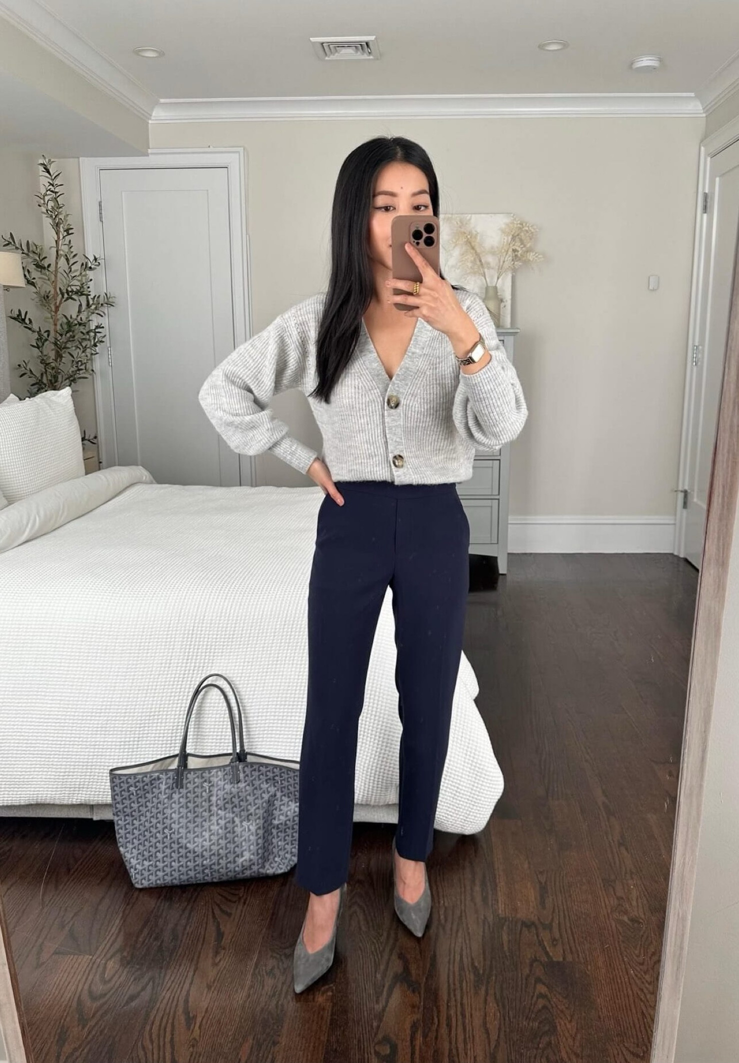 easy work outfit ideas // navy crepe elastic office pants + soft grey cardigan sweater 
•Quince cardigan xs 
•Theory crepe pants 00 (petite friendly length, waist runs a tad loose and has elastic for stretch) 
•Ann Taylor shoes 5 (prior season ; no longer available)
•Anne Klein watch (resized; saved on Amazon.com/shop/ExtraPetite) 
•Goyard tote 

#petite

#LTKworkwear #LTKstyletip