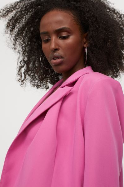 Straight, oversized, double-breasted jacket in woven fabric with peak lapels, fake front pockets ... | H&M (UK, MY, IN, SG, PH, TW, HK)