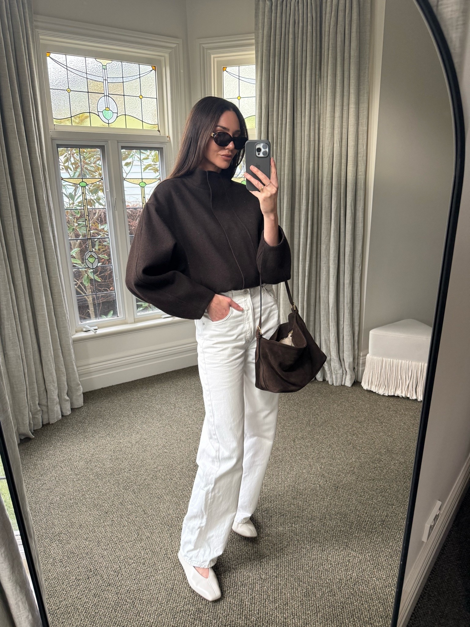 Winter layers 

Chocolate bomber with funnel neck 
White baggy denim 
Chocolate suede handbag 
Cream leather ballet flats 
Celine sunglasses

#LTKaustralia #LTKwinter
