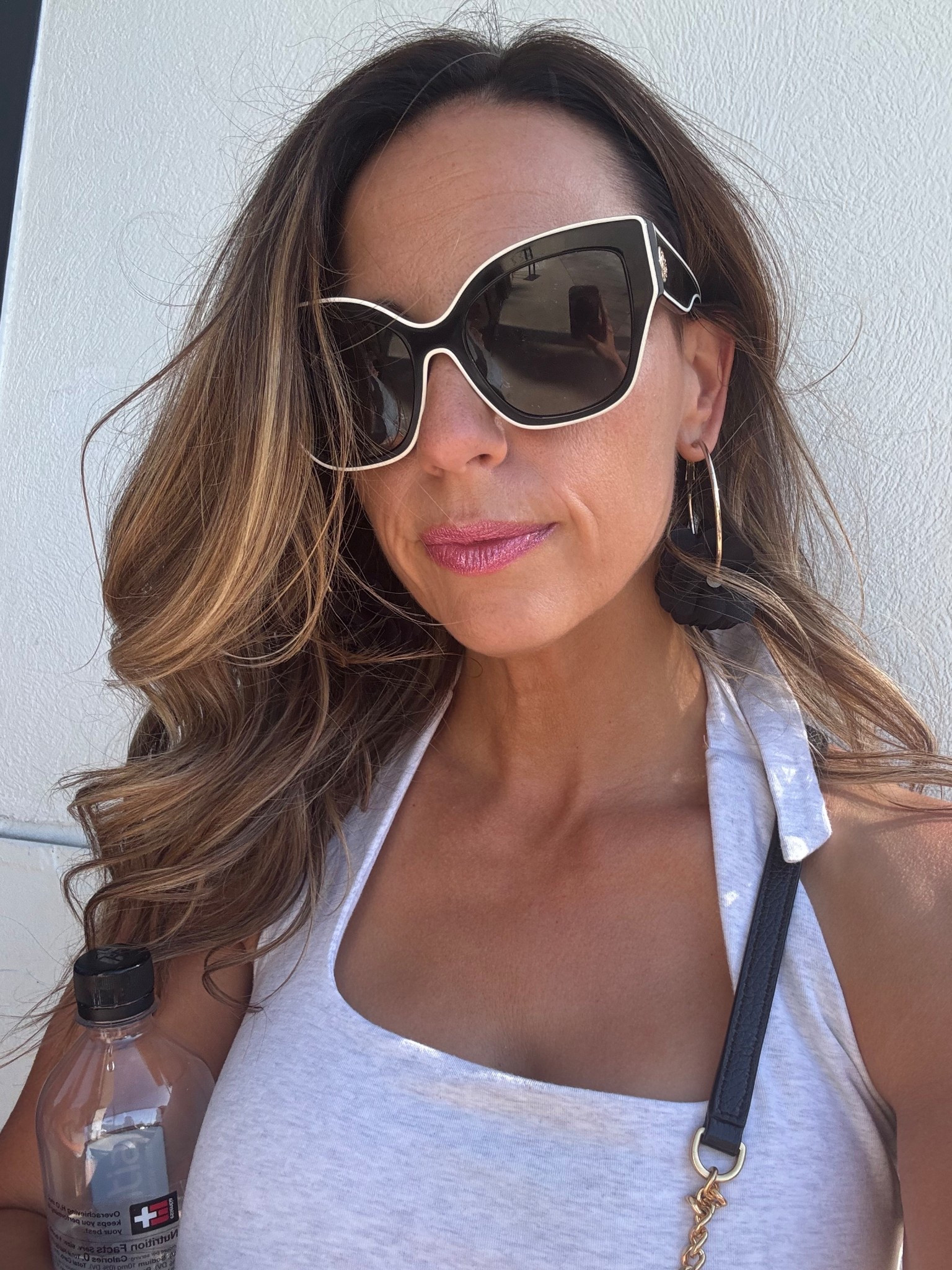 Favorite go-to sunnies 🖤

Loving these Tory Burch shades for that effortless vintage-chic vibe. Paired them with a halter top from Target—I sized up to a medium for a relaxed fit, but a small would’ve worked too.

Finished the look with Fenty Beauty Gloss Bomb Universal Lip Luminizer for the perfect glossy pop. ✨

#LTKselfcare #LTKBeauty #LTKmomlife