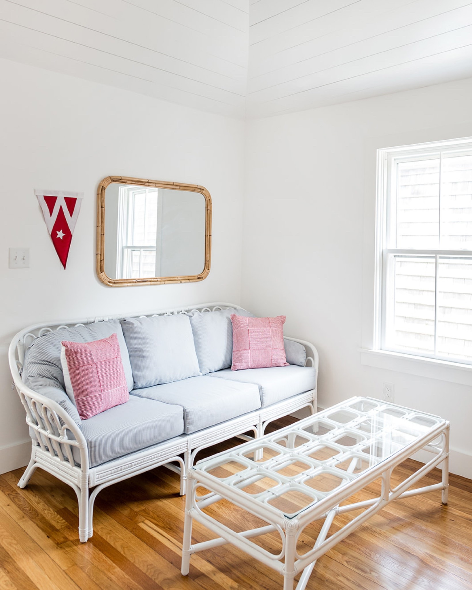 the living space at the #mixedusemini is on the petite side, so we made a few changes during the renovation to really maximize the space. first, we chose to close up an existing exterior door since there was already one off the mudroom right around the corner. we also removed a dilapidated corner cabinet to allow more room for furniture. but the most dramatic transformation of all came from vaulting the ceiling to make the space feel bright and airy. we added shiplap to capture that beachy feel and filled the room with vintage bamboo furniture and red, white, and blue textiles. #dwelloctoberstay #dwelloctober

#LTKHome