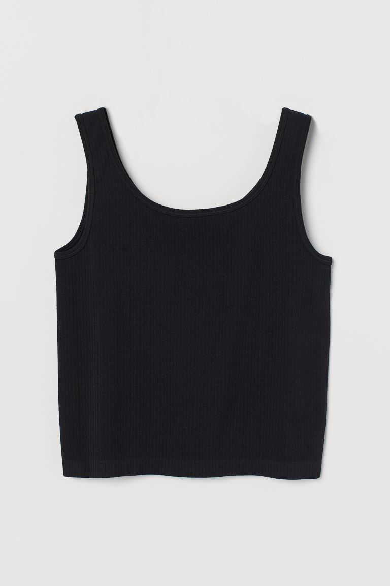 Short tank top in fast-drying, ribbed jersey to help keep you dry and cool while exercising. Desi... | H&M (US + CA)