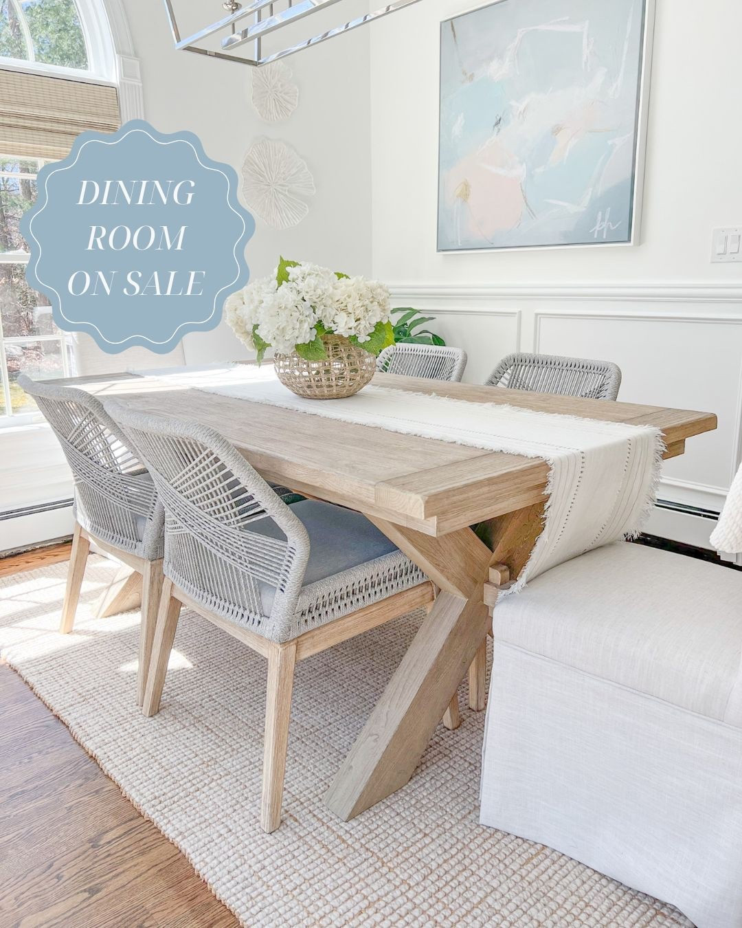The best sale price I've seen on my dining table and my gray rope chairs in at least a year! My rug and woven shades are all on sale as well! My table, in the seadrift finish, is the 74"-104" size, my rug is the natural color, and my woven shades are "tibet ivory." 
---- 
coastal dining room, dining room decor, neutral dining room, neutral home decor, neutral decor, beach decor, beach style, dining room furniture, dining room ideas, faux flowers, amazon hydrangeas, woven vase, large vase, serena & lily vase, coral wall decor, dining room table chairs, pottery barn dining table, Toscana dining room table, dining room chairs, dining room rugs, pottery barn rugs, coastal rugs, coastal artwork, woven shades, 8x10 rugs, 5x8 rugs, 9x12 rugs, dining room tables on sale, dining room ideas, dining room decor, white dining room, jute rugs, wool rugs, neutral rugs, dining tables with leafs, home sales, pottery barn chunky jute rug

#LTKHome #LTKSaleAlert