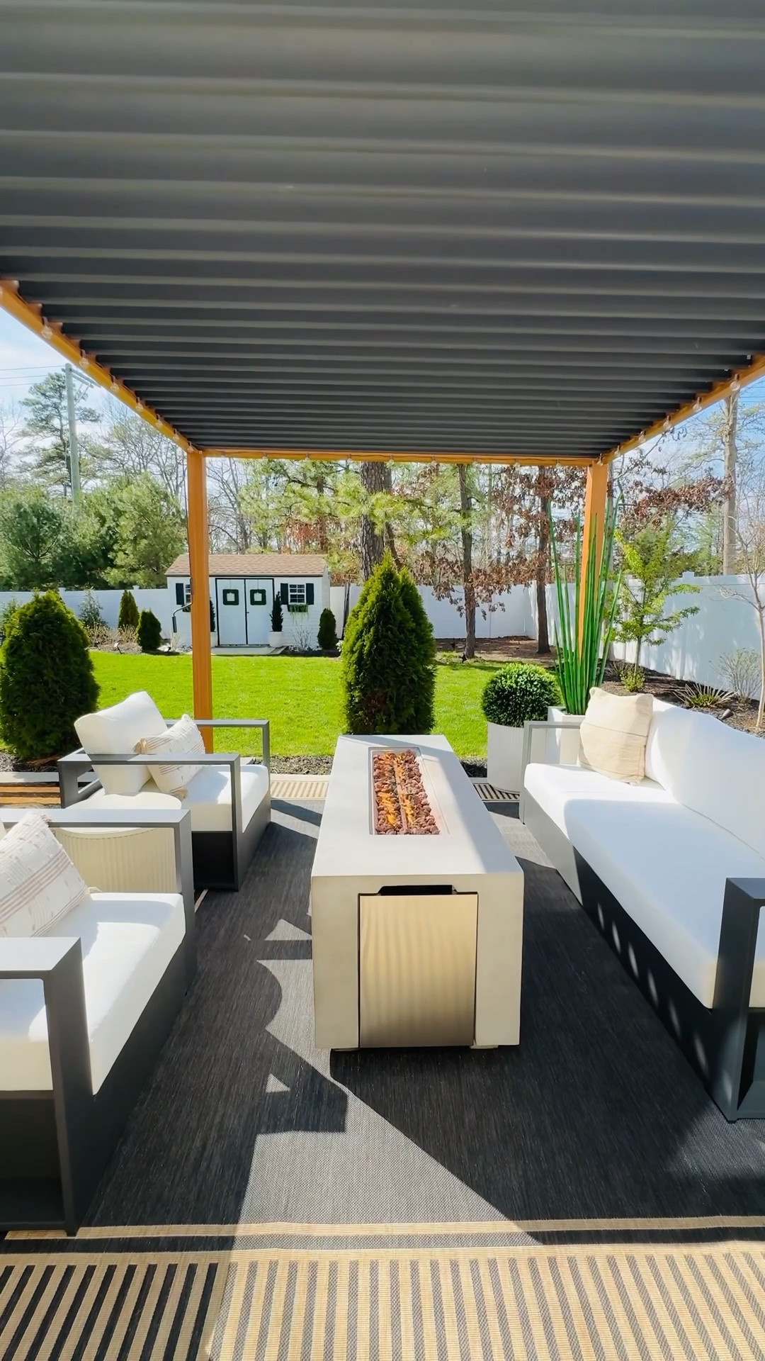 Spring is finally here 🕊️🪴

My favorite season has finally arrived and it's time to get your backyard and patio ready for warmer days ahead. My incredible pergola has an adjustable roof so you can enjoy the outdoors under the sun or shade on demand!! Another favorite addition to our patio is this resort style concrete elongated fire-pit that truly is a conversational piece every time  
we entertain. Your patio should be an extension of your home for you to enjoy all year long so this is your sign to get your patio game on!!

Are you outdoor ready?

#LTKSeasonal #LTKdayinmylife #LTKSpringSale