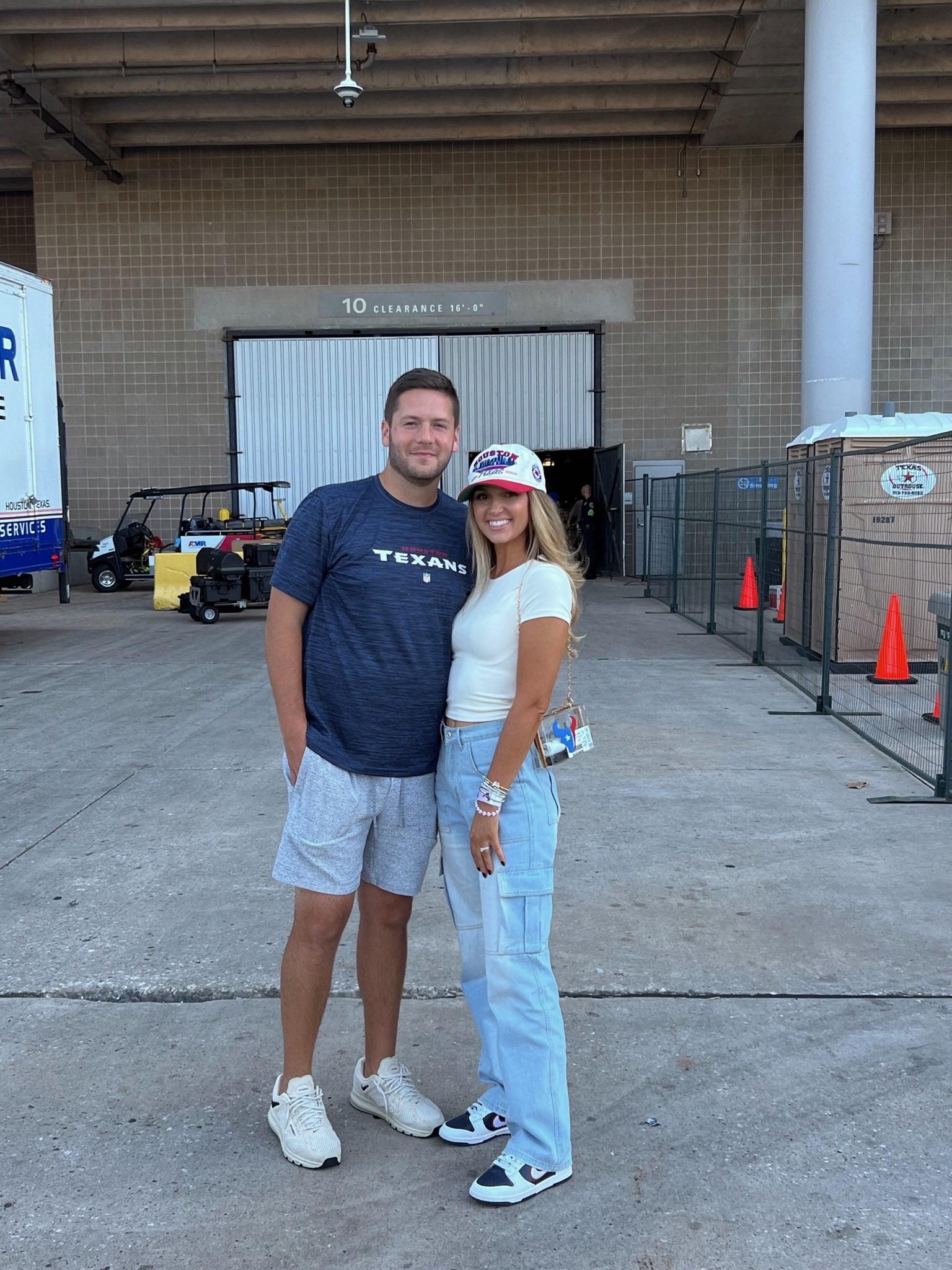 Texans win! NFL game day outfit ❤️💙 cargo jeans, Nike dunks, trucker hat 

#LTKstyletip #LTKSeasonal