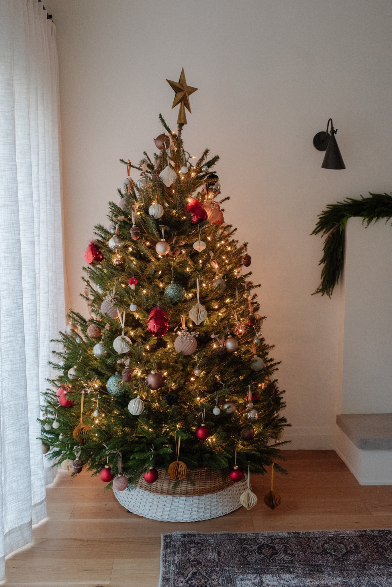 Christmas tree and fireplace sconces. Mantle garland.

#LTKHoliday #LTKstyletip #LTKhome