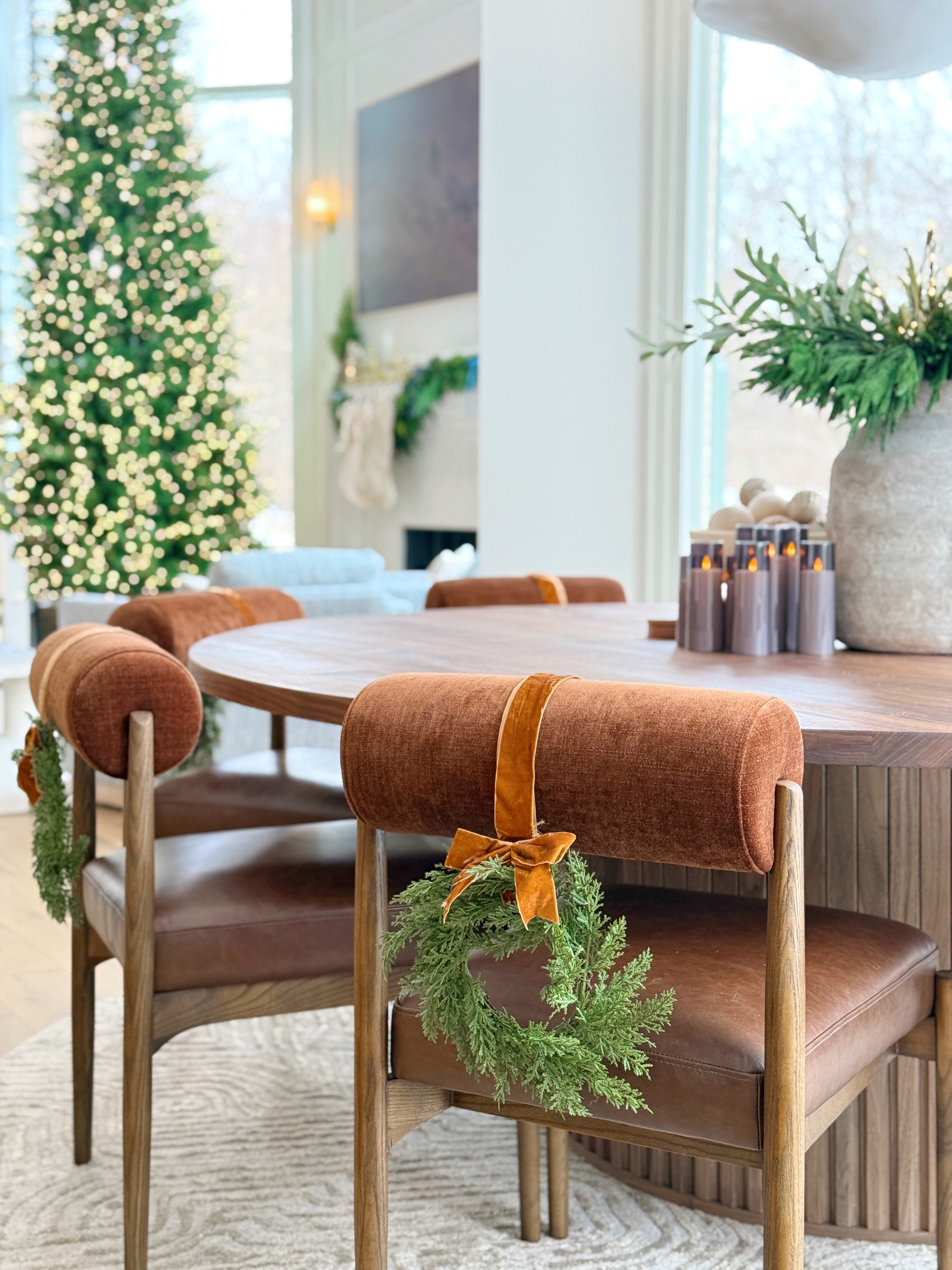 Over the chair wreaths #holidaydecor #holiday #Christmas #diningchairs 

 #LTKHoliday #LTKSeasonal #LTKHome