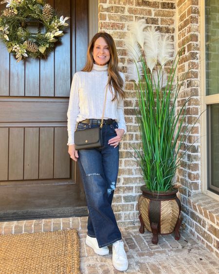 I'm in love with these extra high-waisted ankle-length jeans from Levis. They're actually perfect for my petite height. I'm wearing size 26x27 and am 5'2". They come in other washes if you don't like the destructed look. A cute crossbody bag from Tory Burch is perfect for hands-free shopping and holds my essential items. #petitelook #amazonfinds #affordablestyle #midlifestyle

#LTKSeasonal #LTKstyletip #LTKshoecrush