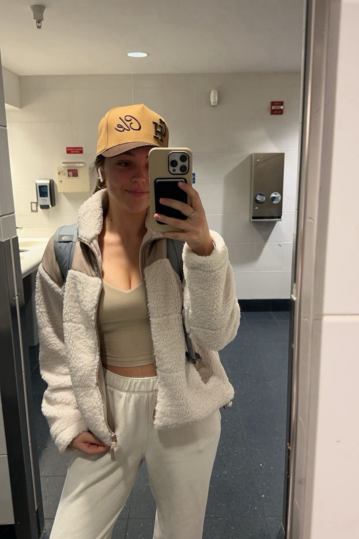 cozy neutral airport outfit that is perfect for busy travel days. cleveland inspired hat is from @emilyroggenburk

#LTKstyletip #LTKtravel #LTKU